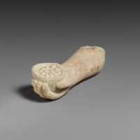 Free download Limestone arm with pieces of fruit (?) held in the hand free photo or picture to be edited with GIMP online image editor