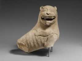 Free download Limestone finial of a funerary stele with a seated lion free photo or picture to be edited with GIMP online image editor