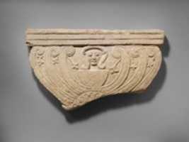 Free picture Limestone finial of a funerary stele with volutes and the head of Hathor to be edited by GIMP online free image editor by OffiDocs