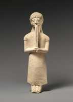 Free download Limestone flute-player free photo or picture to be edited with GIMP online image editor