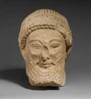Free download Limestone head of a bearded male with a wreath of flowers free photo or picture to be edited with GIMP online image editor