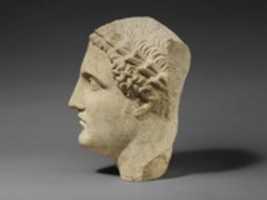 Free download Limestone head of a beardless male votary free photo or picture to be edited with GIMP online image editor
