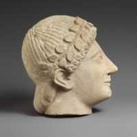Free download Limestone head of a beardless male votary with a wreath of leaves free photo or picture to be edited with GIMP online image editor