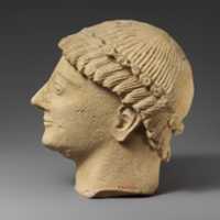 Free download Limestone head of a beardless male votary with a wreath of rosettes free photo or picture to be edited with GIMP online image editor