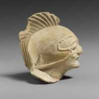 Free download Limestone head of a beardless male with a helmet of Greek type free photo or picture to be edited with GIMP online image editor