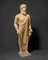 Free download Limestone statue of a bearded man with votive offerings free photo or picture to be edited with GIMP online image editor