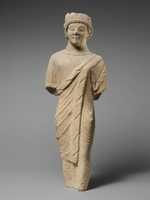 Free download Limestone statuette of a beardless male votary in Greek dress with a wreath of leaves free photo or picture to be edited with GIMP online image editor