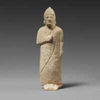 Free download Limestone statuette of a beardless male votary with a conical helmet free photo or picture to be edited with GIMP online image editor
