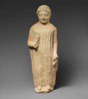 Free download Limestone statuette of a boy holding a bird and a branch of leaves free photo or picture to be edited with GIMP online image editor
