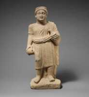 Free download Limestone statuette of a boy with a wreath of leaves free photo or picture to be edited with GIMP online image editor