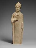 Free download Limestone statuette of a female votary holding a flower free photo or picture to be edited with GIMP online image editor