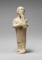 Free download Limestone statuette of a flute-player free photo or picture to be edited with GIMP online image editor