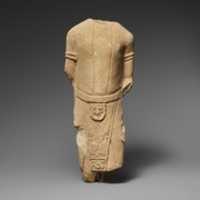 Free download Limestone statuette of a male votary in Egyptianizing dress free photo or picture to be edited with GIMP online image editor