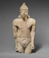 Free download Limestone statuette of a male votary with Cypriot shorts and an Egyptian crown free photo or picture to be edited with GIMP online image editor