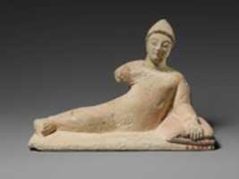 Free download Limestone statuette of a recumbent votary (worshipper) free photo or picture to be edited with GIMP online image editor