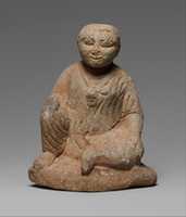 Free download Limestone statuette of a seated temple boy on an inscribed base free photo or picture to be edited with GIMP online image editor