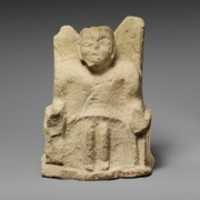 Free download Limestone statuette of a seated Zeus Ammon free photo or picture to be edited with GIMP online image editor