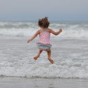 Little girl bathing in the sea  screen for extension Chrome web store in OffiDocs Chromium