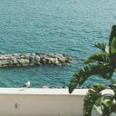 Long rocky beach and seaport  screen for extension Chrome web store in OffiDocs Chromium