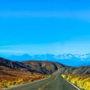 Long straight road with vast mountains  screen for extension Chrome web store in OffiDocs Chromium