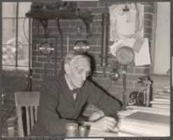 Free download Lowell Textile Institute, Lowell, MA. Man writing at desk. free photo or picture to be edited with GIMP online image editor