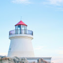 majestic lighthouse standing tall amid the sea  screen for extension Chrome web store in OffiDocs Chromium