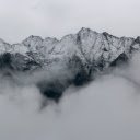 Majestic mountains covered with white snow and clouds  screen for extension Chrome web store in OffiDocs Chromium