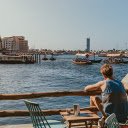 Man drinking water by the river  screen for extension Chrome web store in OffiDocs Chromium
