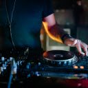 Man in Blue Crew Neck T shirt Playing Dj Controller  screen for extension Chrome web store in OffiDocs Chromium