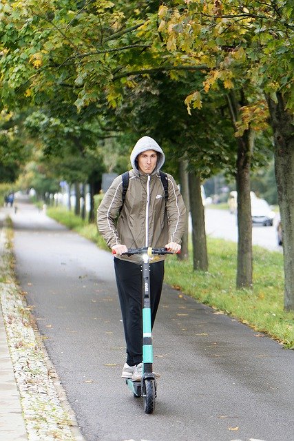 Free download man riding electric scooter free picture to be edited with GIMP free online image editor