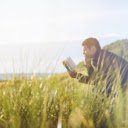Man sitting reading a book  screen for extension Chrome web store in OffiDocs Chromium