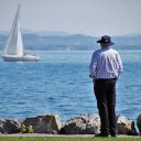 Men looking at boats  screen for extension Chrome web store in OffiDocs Chromium