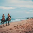 Men Riding Beside Sea  screen for extension Chrome web store in OffiDocs Chromium