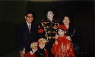 Free download Michael Jackson with Family of Omer Bhatti and Ma Twins (October 26, 1997) free photo or picture to be edited with GIMP online image editor