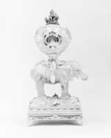 Free download Miniature clock in the form of an elephant supporting a watch case free photo or picture to be edited with GIMP online image editor