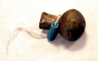 Free download Miniature Hammered Silver Bottle with Blue Bead free photo or picture to be edited with GIMP online image editor