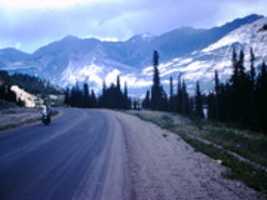 Free download Mountain And Road Scene Near Jasper, Canada free photo or picture to be edited with GIMP online image editor