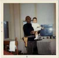 Free download Mr.Ross holding J.C.Booker 2nd in December, 1970 free photo or picture to be edited with GIMP online image editor