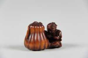 Free download Netsuke of Boy Cutting a Gourd free photo or picture to be edited with GIMP online image editor