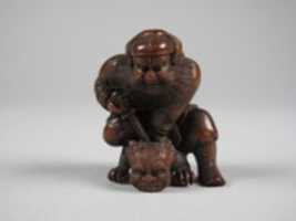 Free download Netsuke of Figure of a Man Killing a Demon free photo or picture to be edited with GIMP online image editor