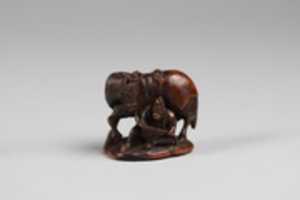 Free download Netsuke of Monkey Holding Horse Rein free photo or picture to be edited with GIMP online image editor