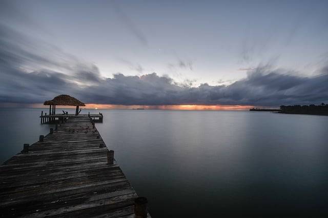 Kostenloser Download von Ocean Pier Dock mit Langzeitbelichtung, kostenloses Bild zur Bearbeitung mit dem kostenlosen Online-Bildeditor GIMP