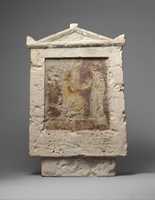 Free download Painted limestone funerary stele with a seated man and two standing figures free photo or picture to be edited with GIMP online image editor