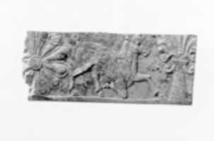 Free download Panel fragment with a kneeling horned animal free photo or picture to be edited with GIMP online image editor