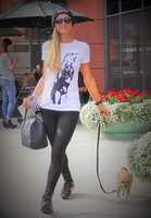 Free download paris-hilton-walking-dog-peter-pan_usa.50NO free photo or picture to be edited with GIMP online image editor