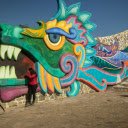People Standing Beside Multicolored Wall Painting  screen for extension Chrome web store in OffiDocs Chromium
