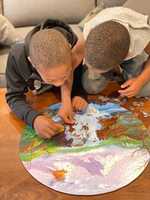 Free download Picture of my sons finishing a puzzle. free photo or picture to be edited with GIMP online image editor