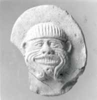 Free download Plaque with face of the demon Humbaba free photo or picture to be edited with GIMP online image editor