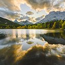 Pond reflecting green trees on the shore  screen for extension Chrome web store in OffiDocs Chromium