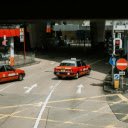 Red cars driving on street in city  screen for extension Chrome web store in OffiDocs Chromium